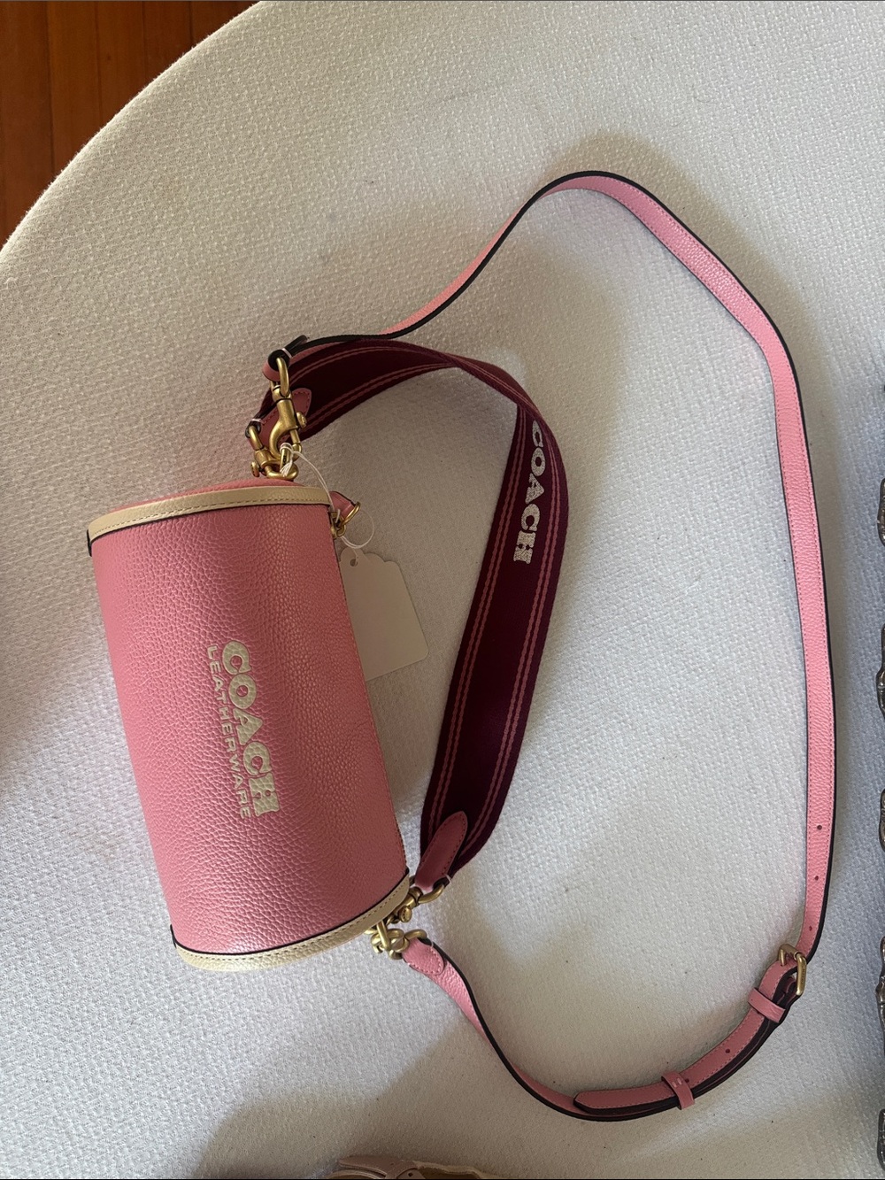 Coach Pink Cylinder Crossbody Bag with Branded Strap